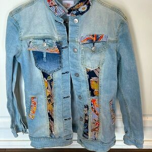 Fun and classy! Versatile one of a kind upcycled denim jacket.